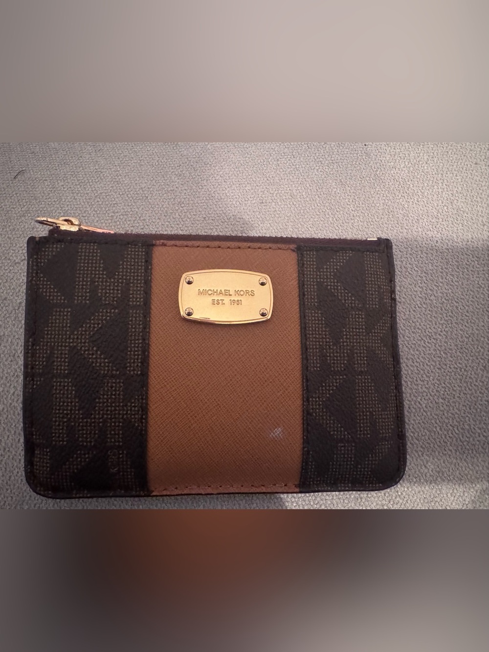 Michael Kors Brown and Black Signature Bi-Fold Wallet with Gold Plaque